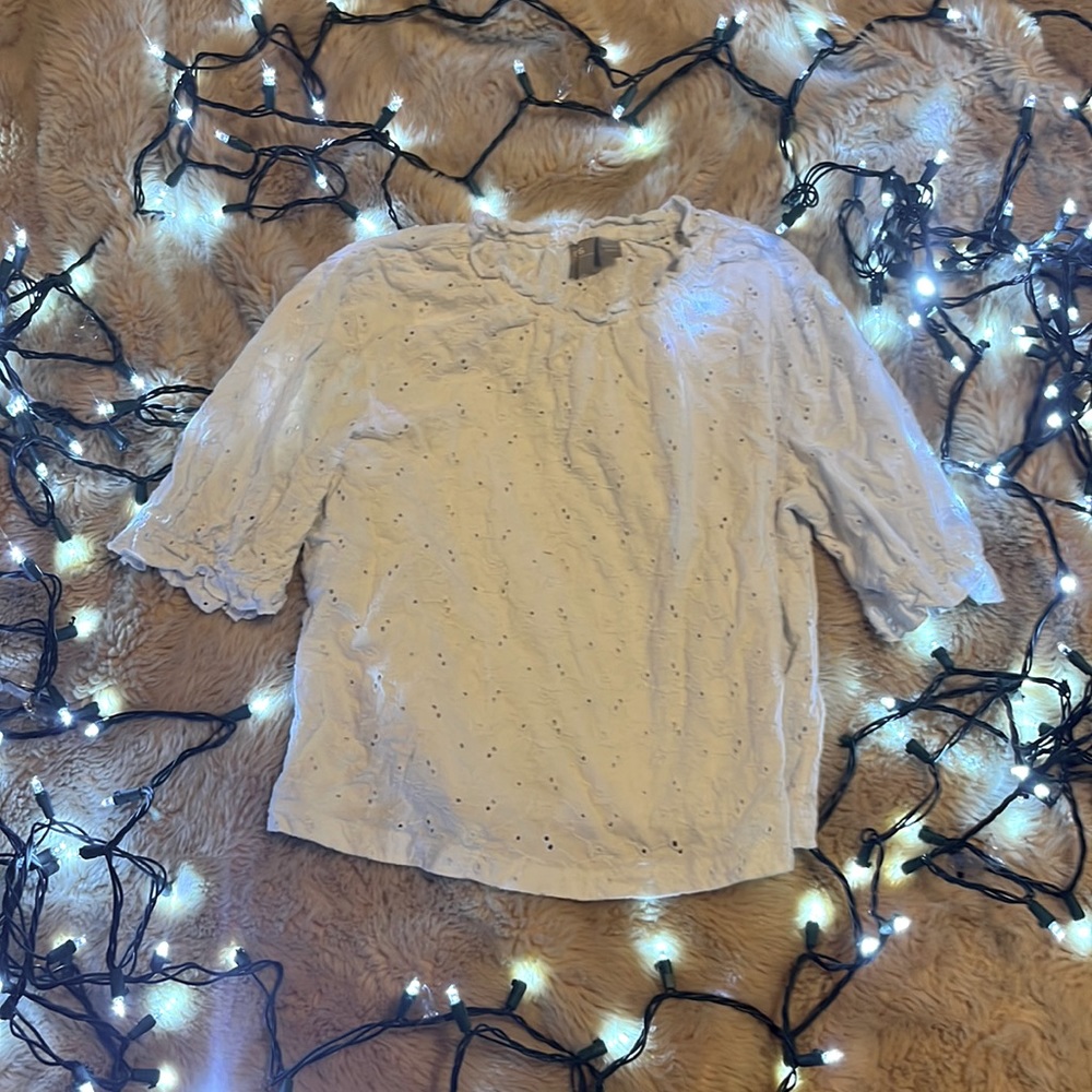 White top with holes.